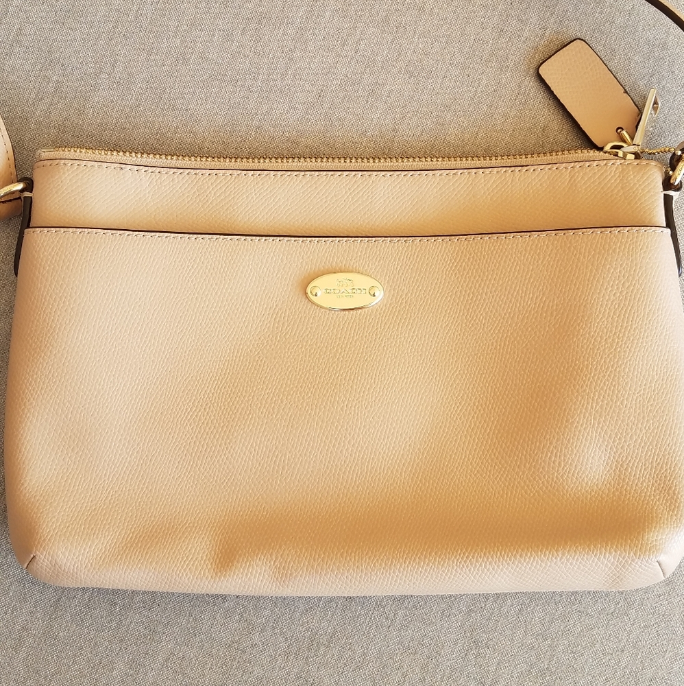 Tan Coach crossbody bag